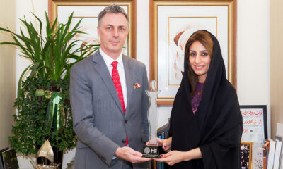 Ameera Abdel Rahim Binkaram with HMH CEO Laurent A. Voivenel