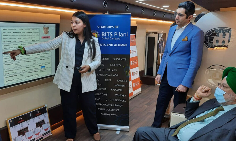 BITS Pilani Dubai Campus student briefing visitors at the India Innovation Hub at Expo 2020