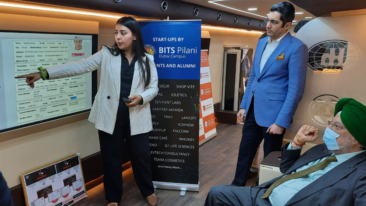 BITS Pilani Dubai Campus student briefing visitors at the India Innovation Hub at Expo 2020
