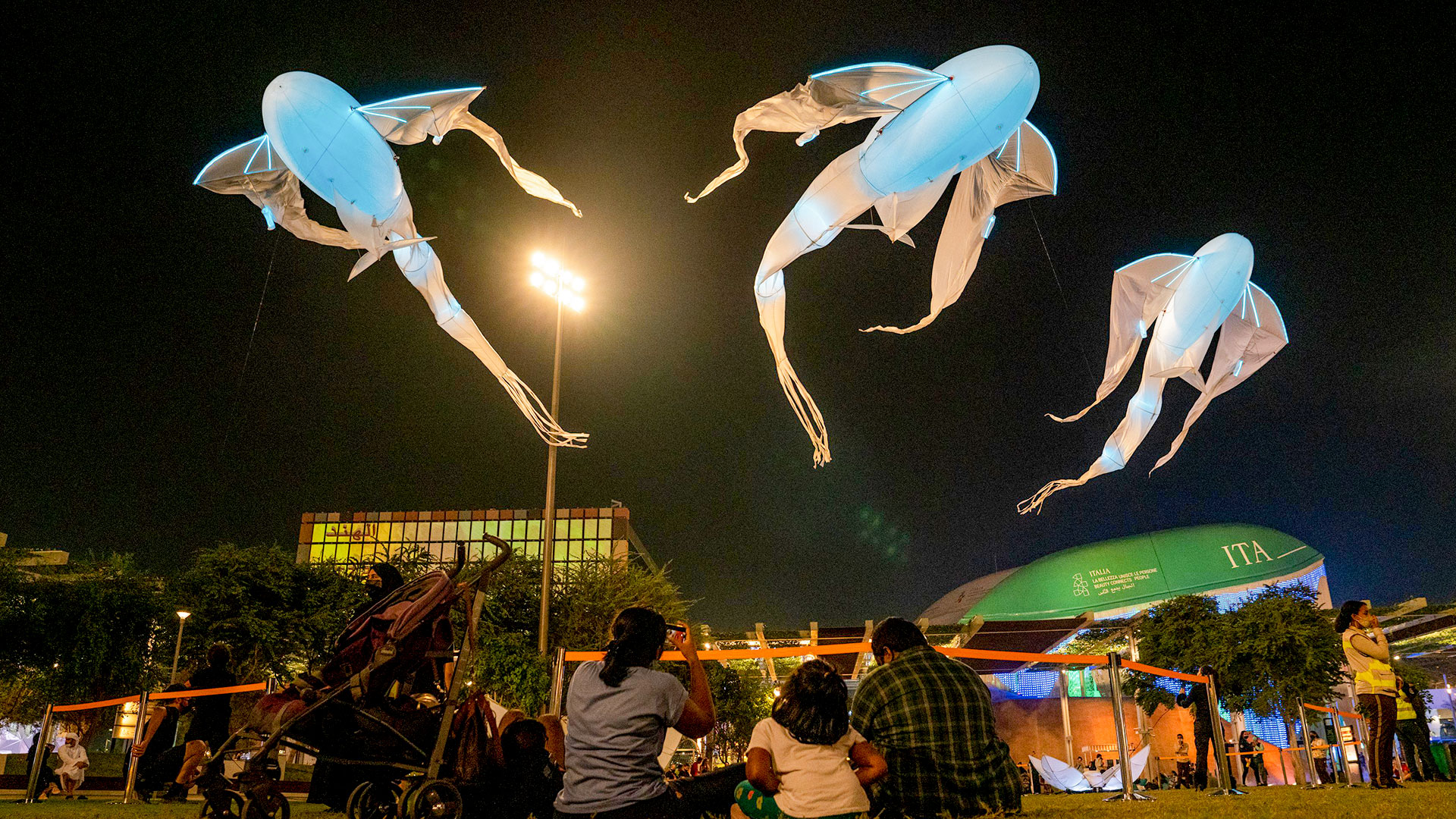 Visitors watching the Kaleidoscope - Lumineoles at Al Forsan Park